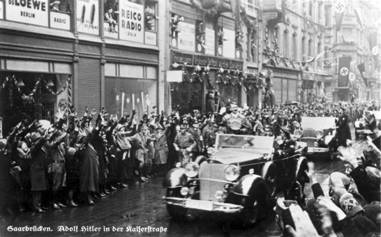 Adolf Hitler crosses the streets of Saarbrücken